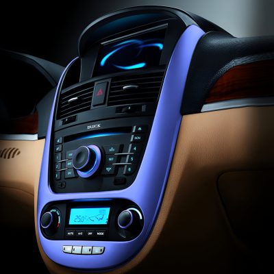 Bluetooth-enabled car dashboard with climate control and multimedia system in a luxury vehicle.