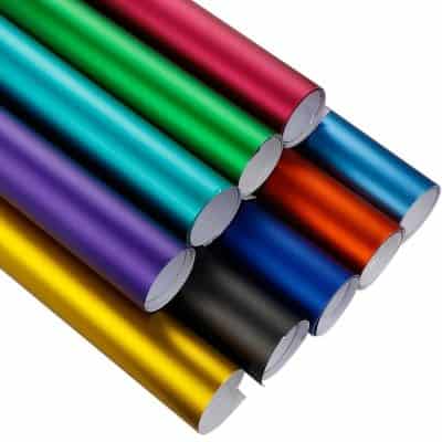 Vivid metallic-colored rolls of adhesive vinyl sheets for crafts, signage, and customization projects.