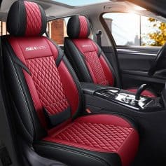 Red quilted leather car seat covers with black accents, custom-fit for luxury vehicles, offering comfort and style for drivers and passengers.