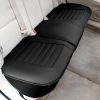 Black car seat cover on vehicle backseat for protection and comfort, ideal for automotive interior customization.