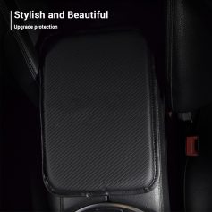 Black leather car armrest with textured pattern and sleek design for vehicle interior comfort and style.