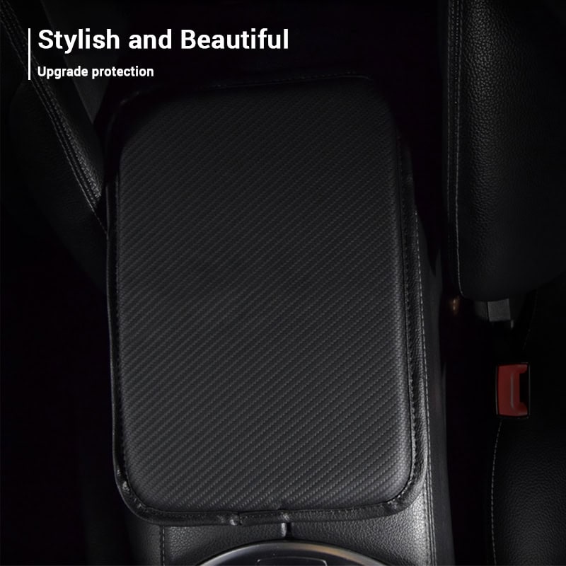 Black leather car armrest with textured pattern and sleek design for vehicle interior comfort and style.