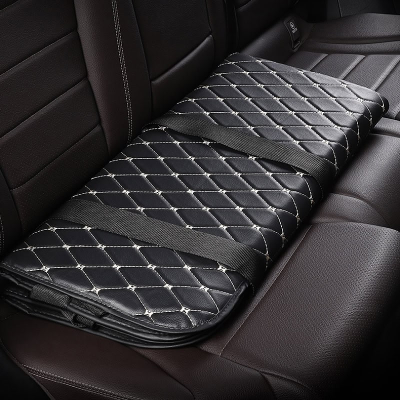 Comfortable car seat cushion with diamond-stitched black leather design, perfect for vehicle comfort and support. Ideal for enhancing driving experience and protecting seats.
