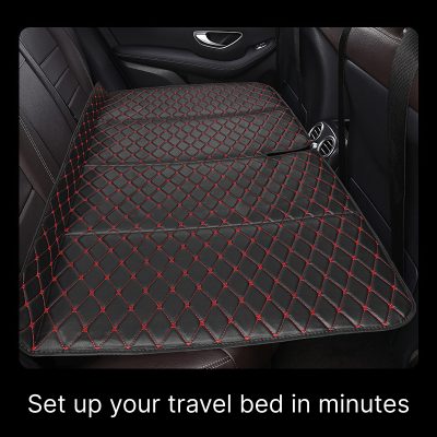 Luxury car backseat travel bed with quilted black and red design for comfort and protection. Perfect for safe travel, easy to install, and waterproof. Enhance your vehicle’s interior today.