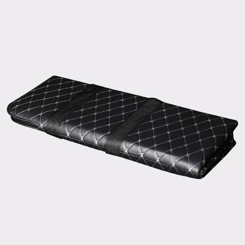 Luxury black quilted protective glasses case with elastic strap for secure fit, ideal for storing and transporting eyewear safely. Perfect for optical stores and personal use.