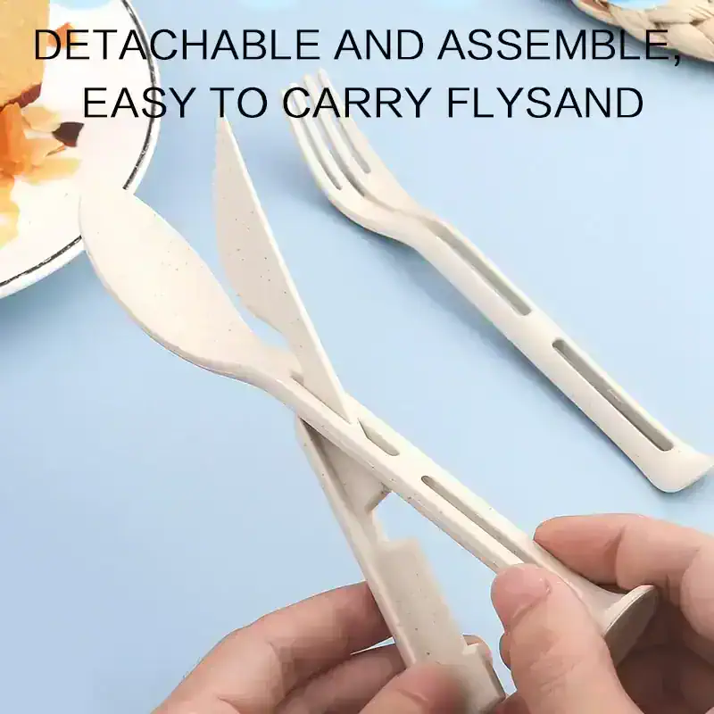 Detachable white plastic travel cutlery set with fork and knife for camping and picnics.
