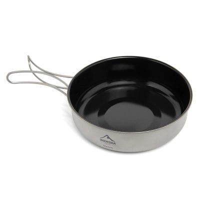 Stainless steel frying pan with non-stick coating, ergonomic handles, ideal for cooking and kitchen use. Perfect for preparing a variety of meals in home or professional kitchens.