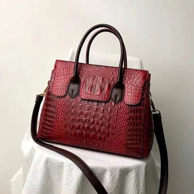 Luxurious red crocodile-embossed leather handbag from Monalisa Store, perfect for elegant fashion and accessories enthusiasts.