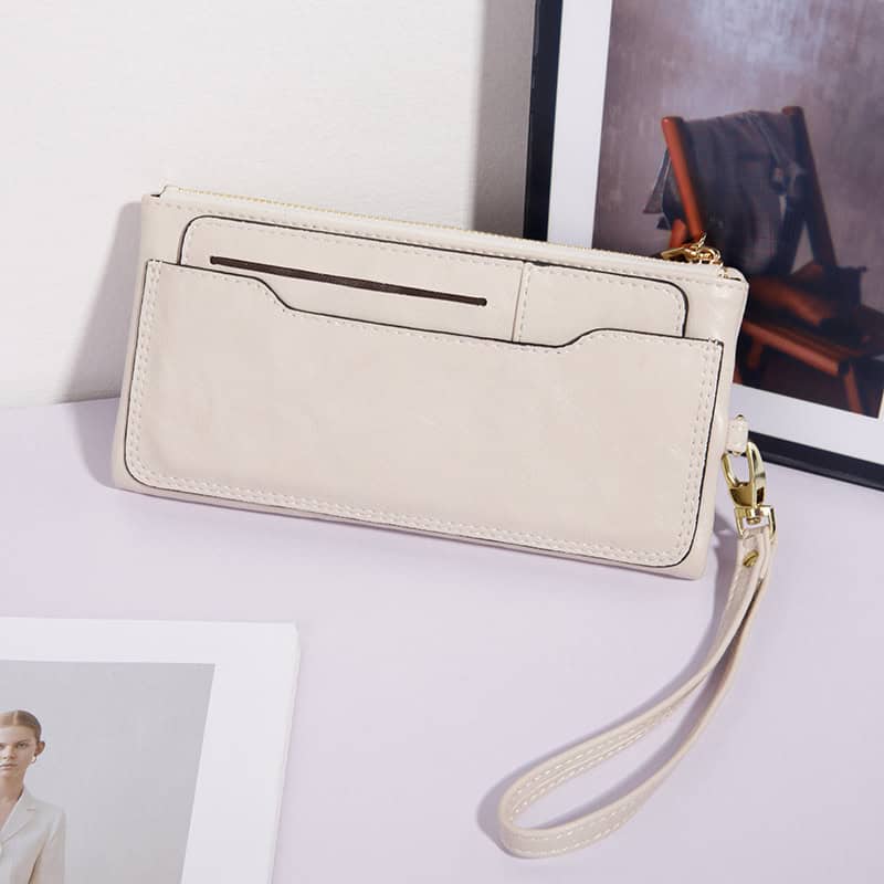 Stylish cream wristlet and clutch with card slots, ideal for travel and daily use, from Monalisa Store for women.