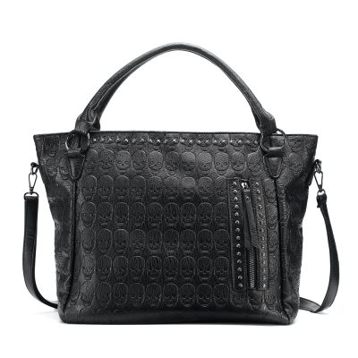 Skull embossed black leather handbag with studded zipper detail and adjustable strap, ideal for fashion-forward accessories.