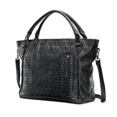 Skull embossed black leather tote bag, stylish and trendy accessory, perfect for fashion-forward women, with interior pockets and adjustable straps, ideal for everyday use.