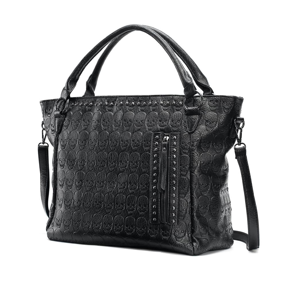 Skull embossed black leather tote bag, stylish and trendy accessory, perfect for fashion-forward women, with interior pockets and adjustable straps, ideal for everyday use.
