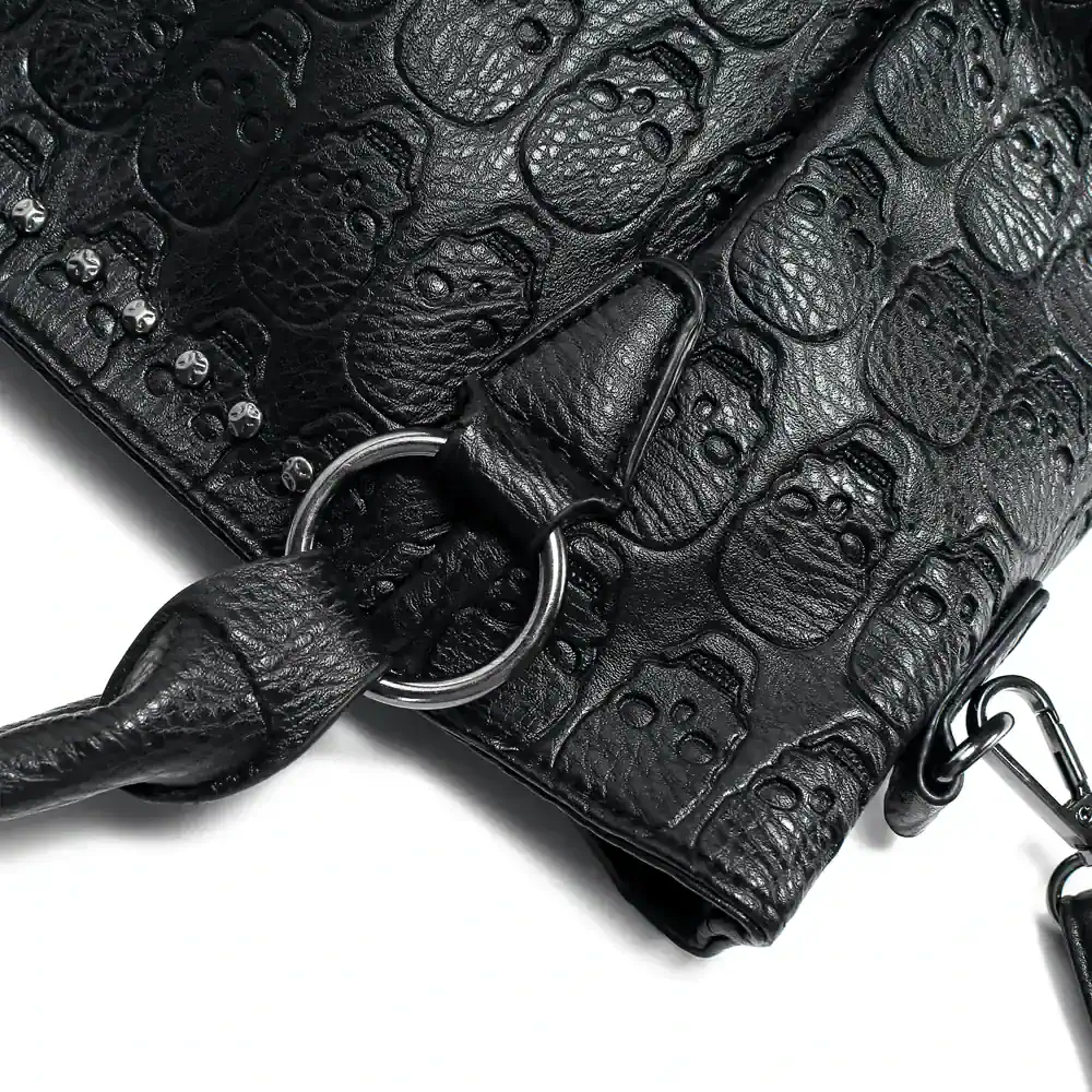 Luxury black crocodile-embossed leather bag with silver hardware, trendy strap, and stylish design, perfect for fashion-forward individuals.