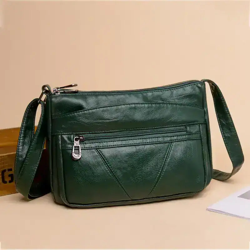 Leather shoulder bag for men and women, stylish and durable accessory for daily use, featuring multiple compartments and modern design, perfect for office and casual outfits.