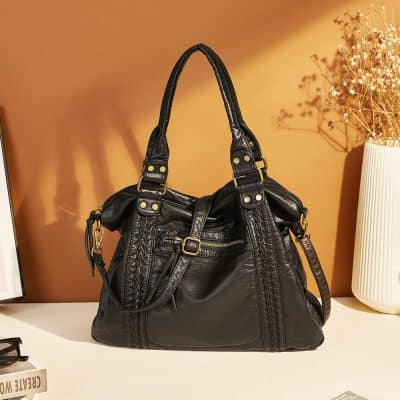 Stylish black leather handbag for women, luxury designer tote with multiple compartments, perfect for everyday use and travel, high-quality fashion accessory.