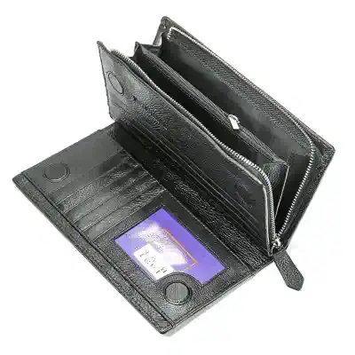 Luxury black leather wallet with RFID blocking card slots and zippered coin compartment, ideal for stylish women and men. Perfect for everyday use and travel, combining functionality with elegance.