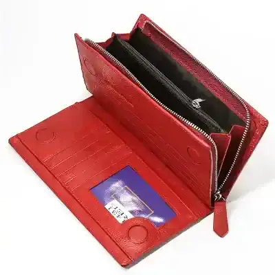 Fashion red leather wallet with multiple card slots and zipper compartment for secure storage. Stylish and functional accessory for everyday use. Suitable for organizing cards, cash, and essentials.