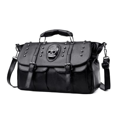 Stylish black leather handbag with skull embellishment, metal studs, adjustable shoulder strap, perfect for fashion-forward accessories.