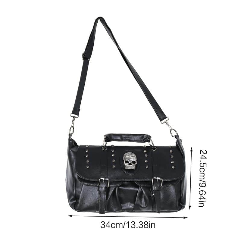 Premium black leather fashion shoulder bag with skull embellishment, adjustable strap, and multiple compartments, perfect for trendy accessories and stylish everyday use.