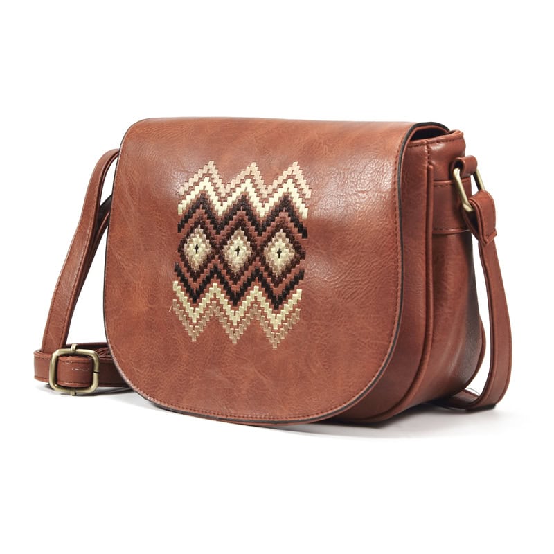 Faded brown leather crossbody bag with embroidered geometric design, perfect for stylish women, ideal for daily use and travel.