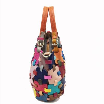Colorful leather patchwork tote bag for women, stylish and spacious fashion accessory. Perfect for everyday use, travel, and casual outings with vibrant design.
