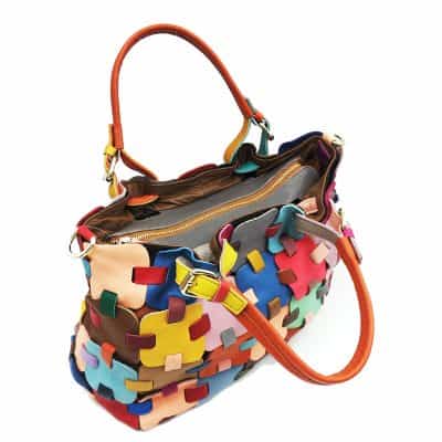 Vibrant multicolor patchwork leather handbag with adjustable strap and gold zipper detail, perfect for stylish accessories and high-end fashion.