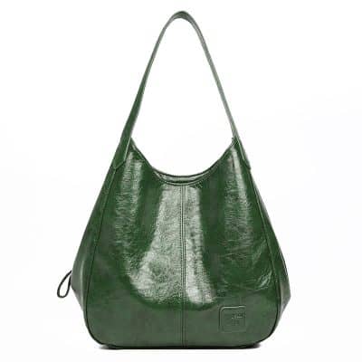 Luxurious green leather shoulder bag from Monalisa Store, perfect for fashion-forward accessories and retail display. High-quality craftsmanship and elegant design.