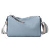 Light blue leather crossbody bag with striped adjustable strap, stylish and functional accessory for women.