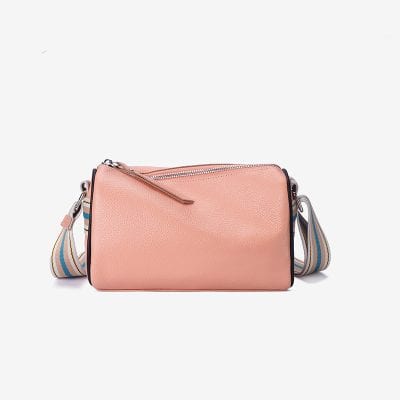 Pink designer handbag with striped adjustable shoulder strap, perfect for eye care professionals and optometry storefronts.