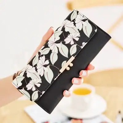 Black floral wallet with white and pink accents, perfect for stylish optical accessories storage and organization, ideal for Monalisa Medical Store customers.