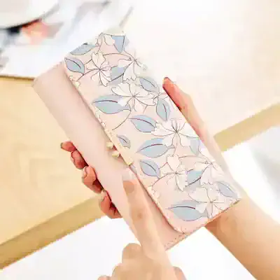Elegant floral patterned wallet in pastel pink with gold accents, ideal for storing optics and accessories at Monalisa Store. Perfect for stylish optical cases and optical accessories.