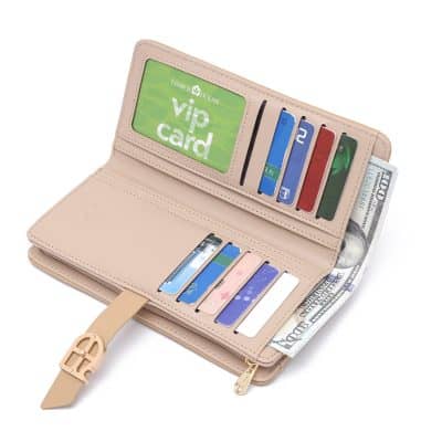 Soft pink wallet with multiple card slots holding credit and ID cards, and cash compartment, perfect for organized optical shopping and accessories at Monalisa Medical.