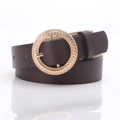 Genuine black leather belt with a decorative gold buckle, stylish accessory ideal for fashion and casual wear. Perfect for men and women seeking premium quality belts for everyday or special occasions.