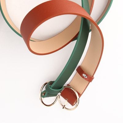 Brown, green, and beige leather belts with gold rings, fashionable accessories for men and women, displayed at Monalisa Store for stylish look and versatile wear.