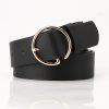Black leather belt with a rose gold circular buckle, stylish accessory for fashion-conscious individuals. Perfect for dressy or casual outfits, adding elegance to your look.