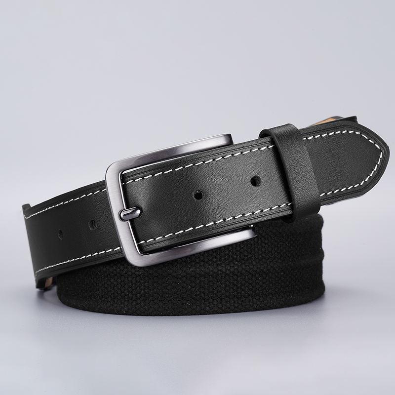 Black leather belt with white stitching and silver buckle, suitable for men's fashion accessories.