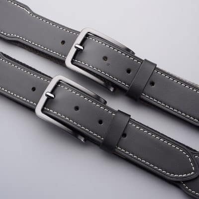 High-quality black leather belts with silver buckles, ideal for stylish optometry uniforms and accessories. Perfect for professional eyewear stores and optometry practice attire.