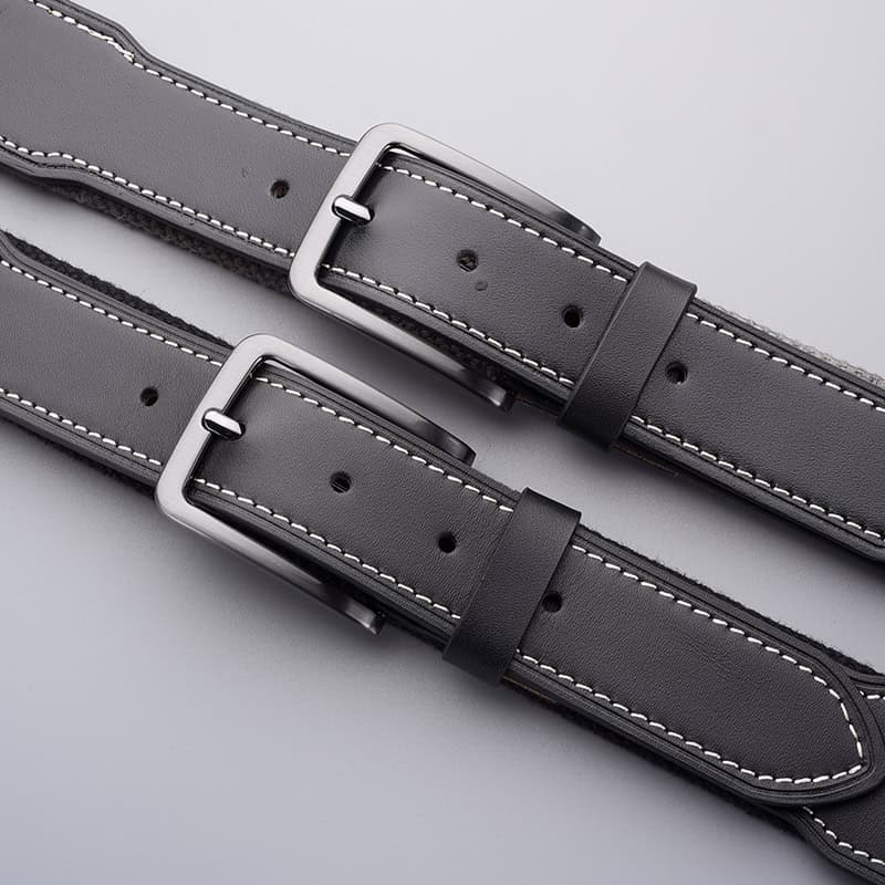 High-quality black leather belts with silver buckles, ideal for stylish optometry uniforms and accessories. Perfect for professional eyewear stores and optometry practice attire.