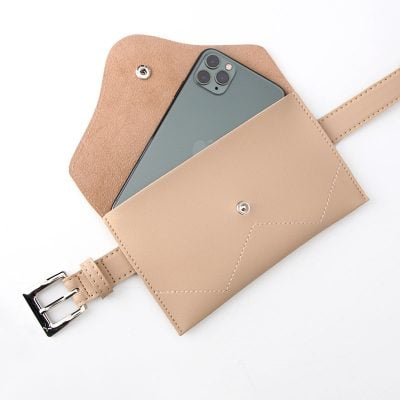 Elegant beige leather phone case with strap, designed for iPhone, showcasing stylish and functional accessories at Monalisa Store.
