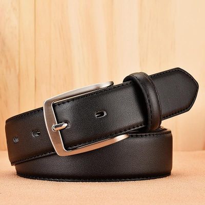 Black leather belt with silver buckle, perfect for men's fashion accessories.