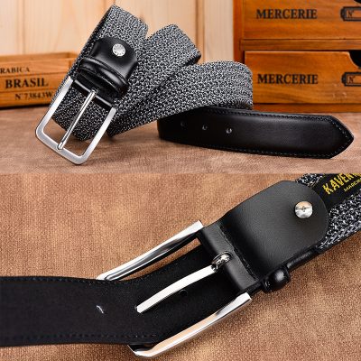 Genuine leather fabric belt with black and white woven pattern, silver-tone buckle, and adjustable length, perfect for stylish casual or formal outfits.