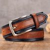 Black and brown leather belt with silver buckle, stylish accessory for men and women.