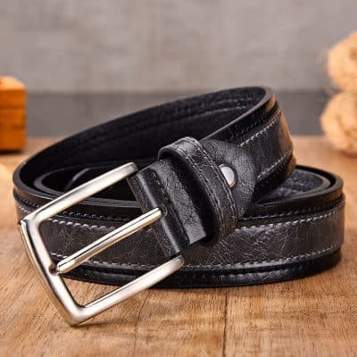 Black leather belt with silver buckle for men and women, stylish accessory for daily wear and formal outfits.