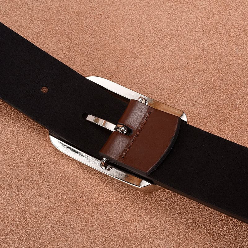 Black leather belt with brown leather loop for men and women, stylish accessory for fashion and formal outfits.