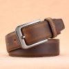 Brown leather men's belt with silver buckle, stylish and durable accessory for formal or casual wear. Perfect for complete your fashion look.