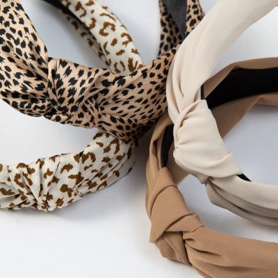 Soft leopard print headbands with elegant knotted design, ideal for stylish accessories and hair styling. Perfect for casual or formal wear, available at Monalisa Store.