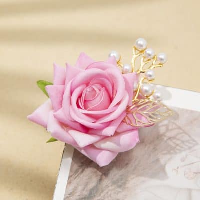 Pink artificial rose with pearl and gold leaf hair accessory, elegant and feminine jewelry piece, perfect for special occasions or gift-giving, available at Monalisa Store.