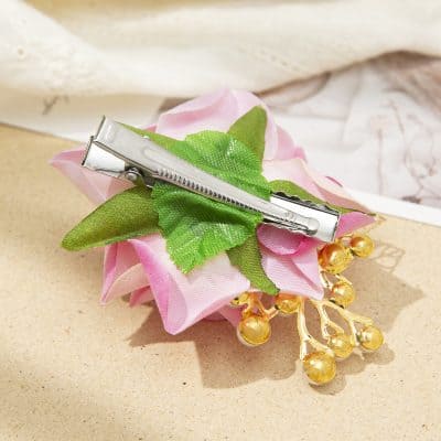 Silk pink flower with green leaves hair clip and golden jewelry accent - Monalisa Store.