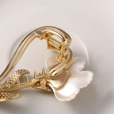 Gold floral hair clip jewelry accessory for women at Monalisa Store.