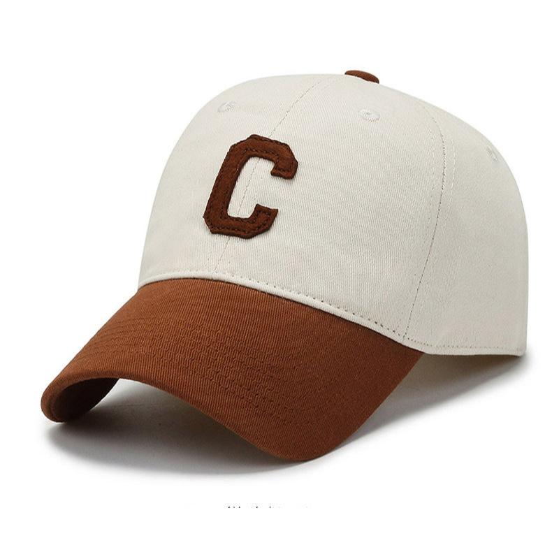 Cap with beige crown and brown brim featuring a stitched letter "C" logo, suitable for sports, casual wear, and outdoor activities, emphasizing comfort and style for men and women.